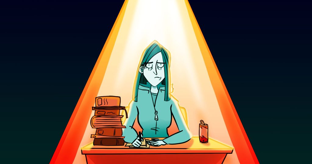 A worried looking student sits at a desk