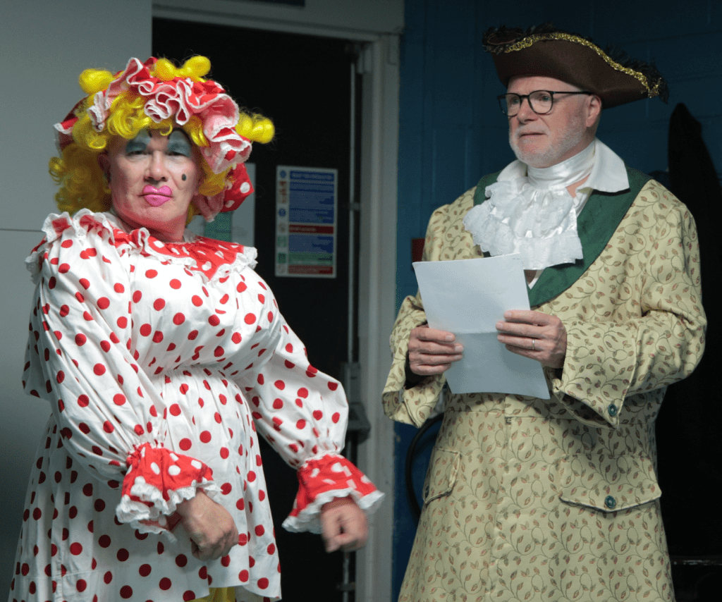 Two pantomime characters
