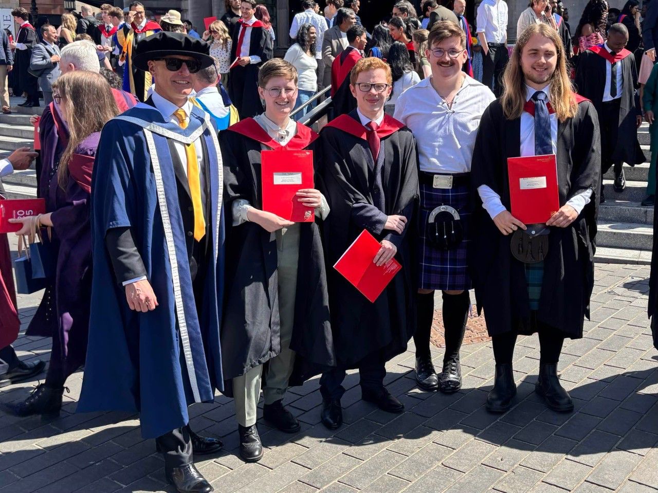 BSc graduates Oran Talbot, Mitchell MacPherson, Andrew Clelland, and Aedan Wilson after receiving their awards.
