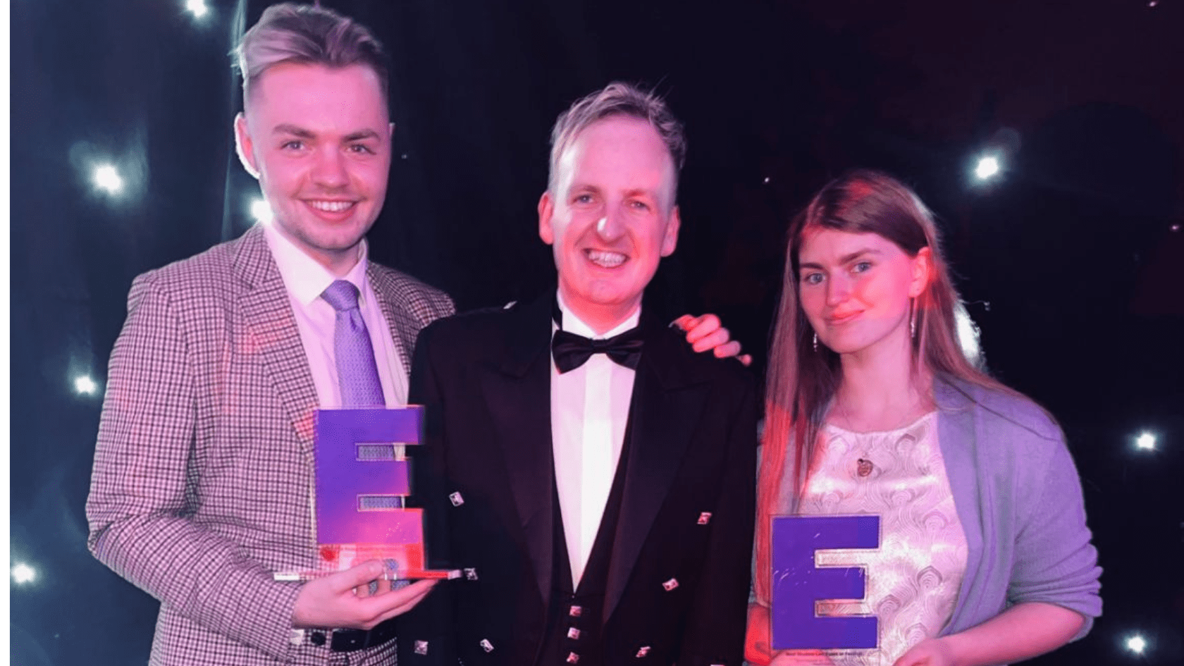 A picture of International Festival and Events professor Gary Kerr with his winning students.