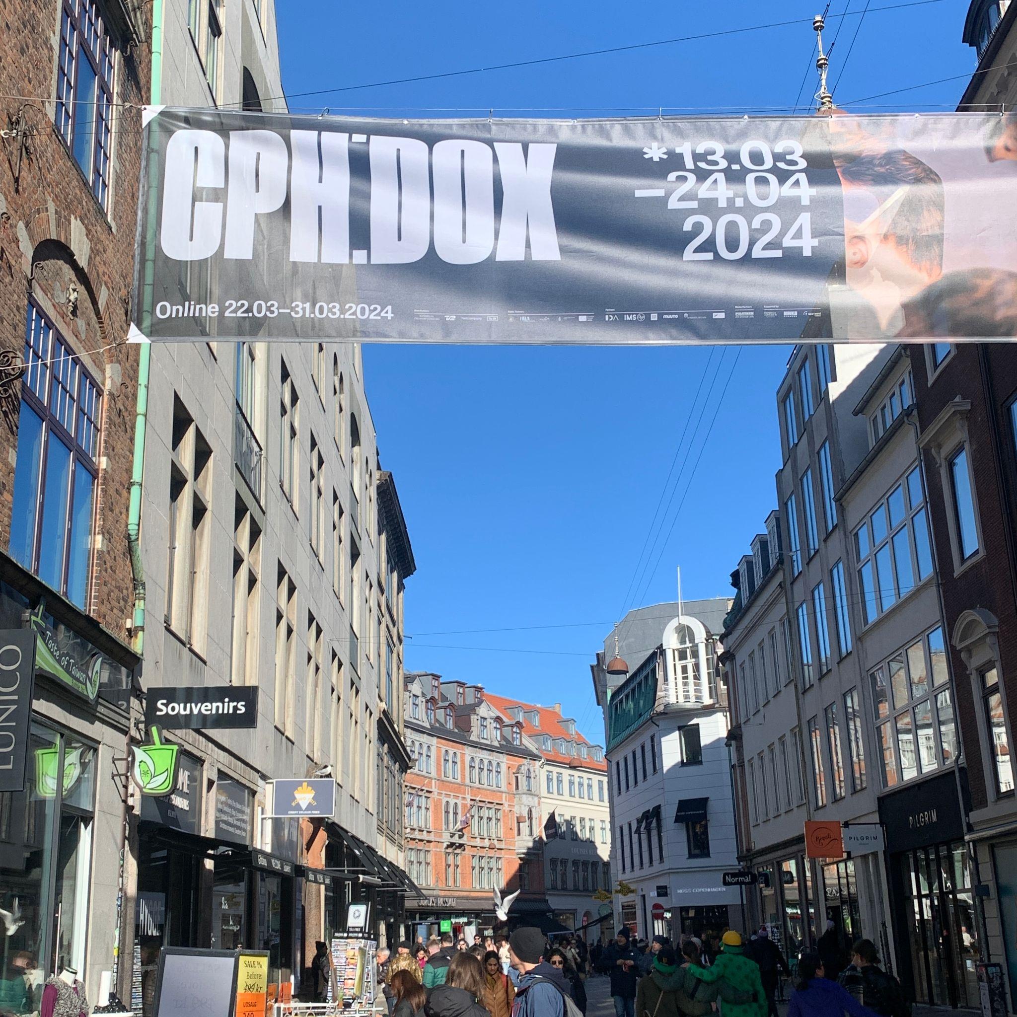 CPH:DOX banner hanging in the streets of Copenhagen