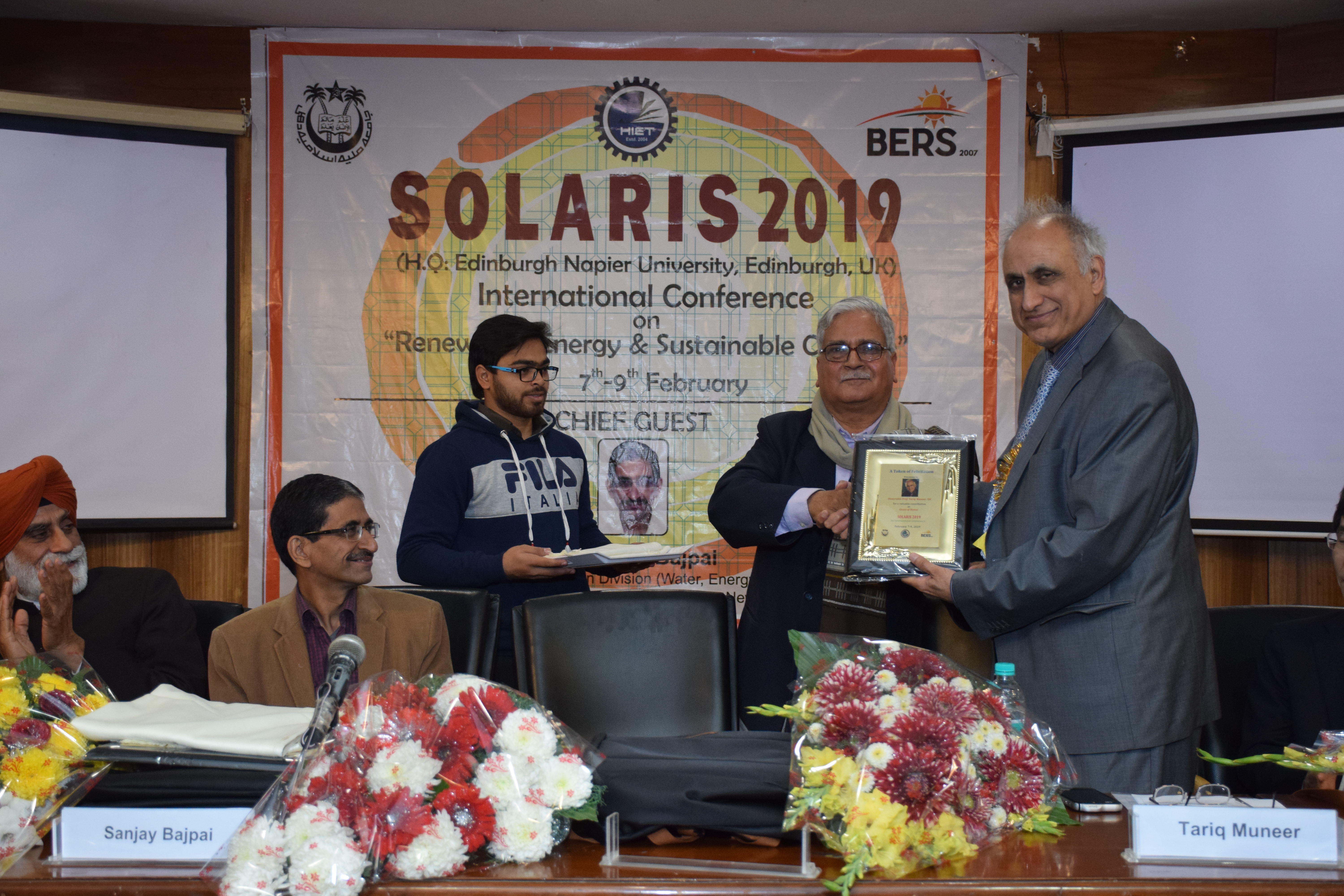 Tariq receiving award at Solaris conference.Feb 2019